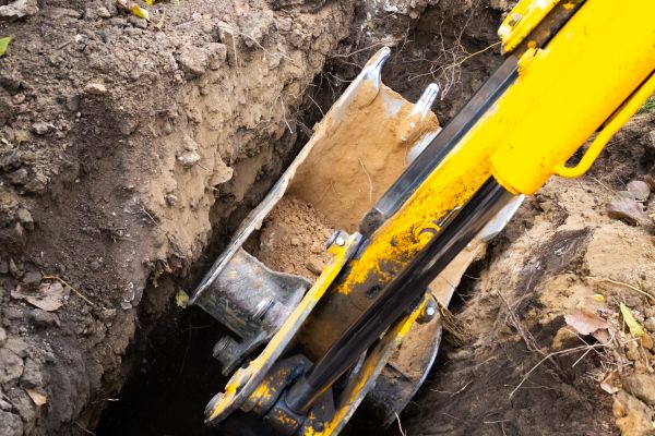 Downspout Trenching in Warren